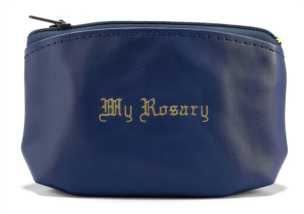 My Rosary Pouch in blue and white shown open on a wooden surface with a rosary inside